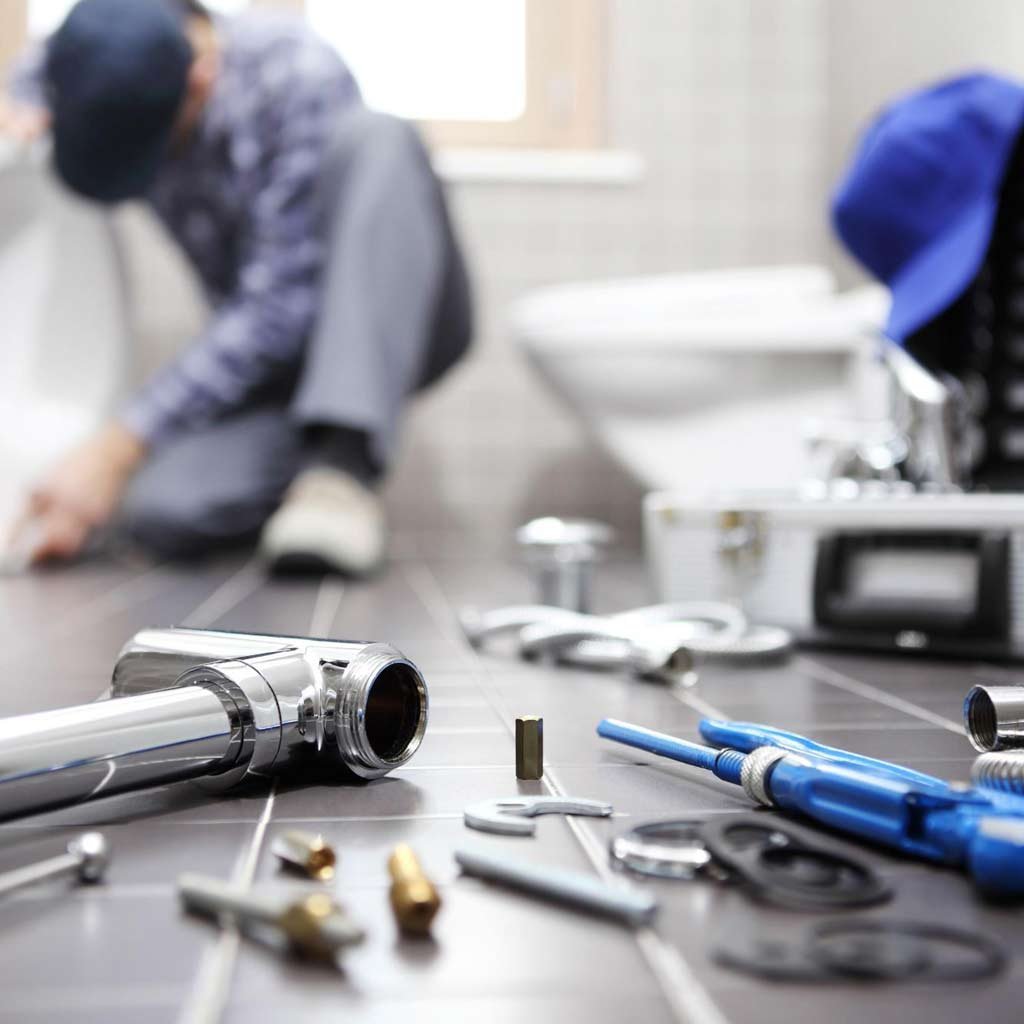 plumbing-plumber plumber is working